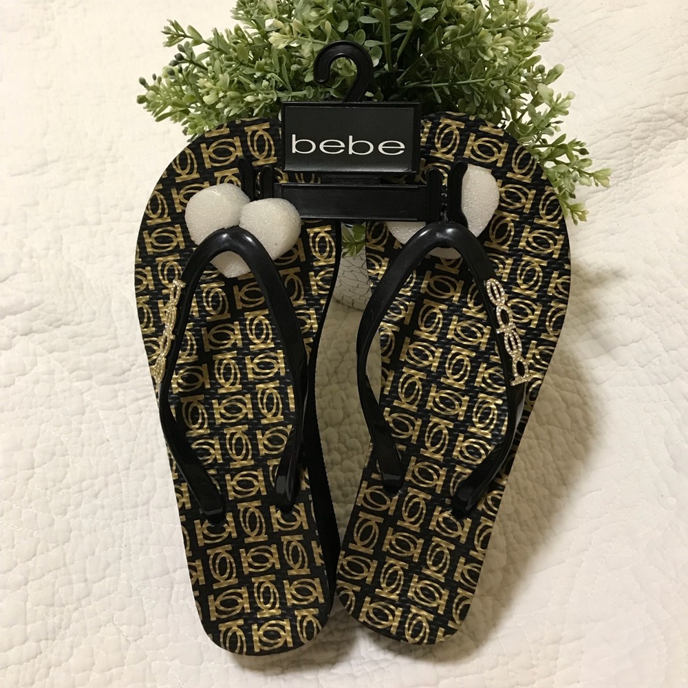 Bebe rhinestone logo rubber thong sandals